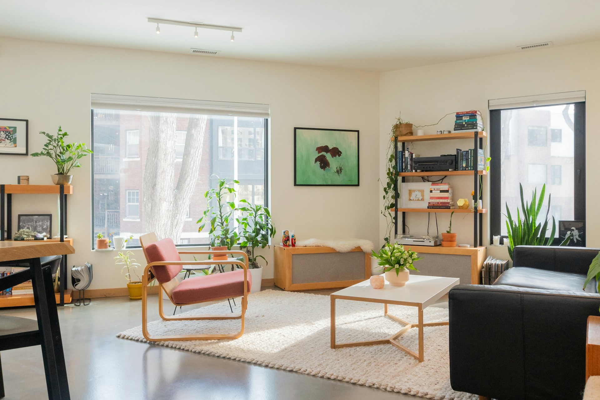 A bright living room with armchairs